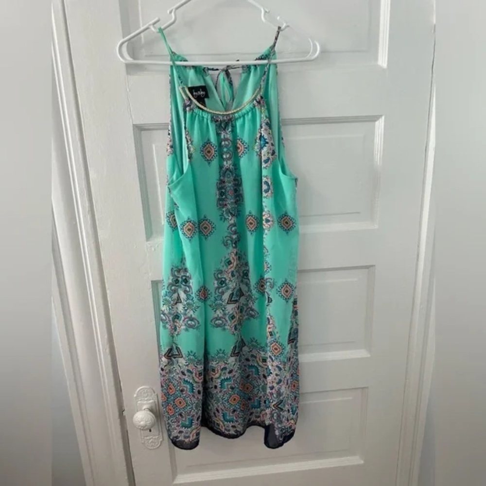 Teal dress with designs